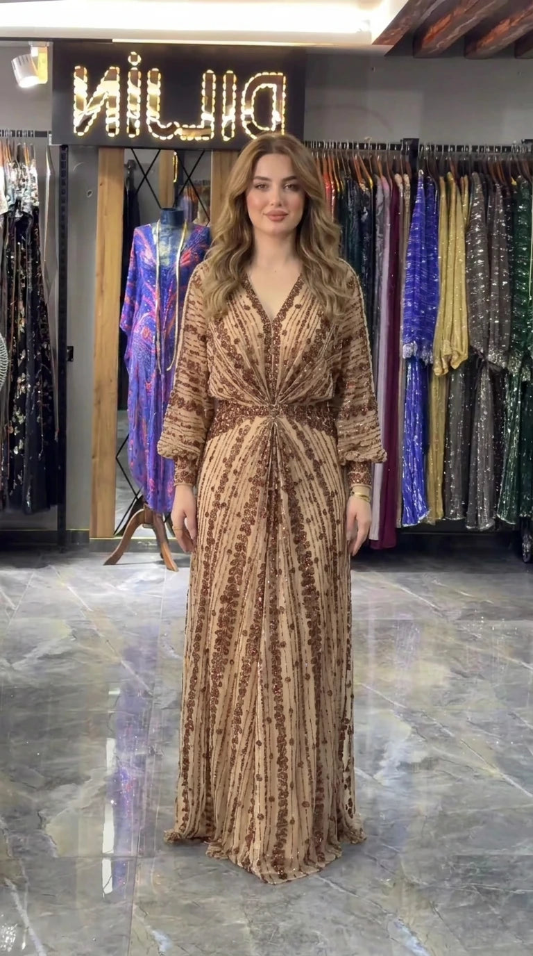 Champagne gold sequin embroidered formal maxi gown on model