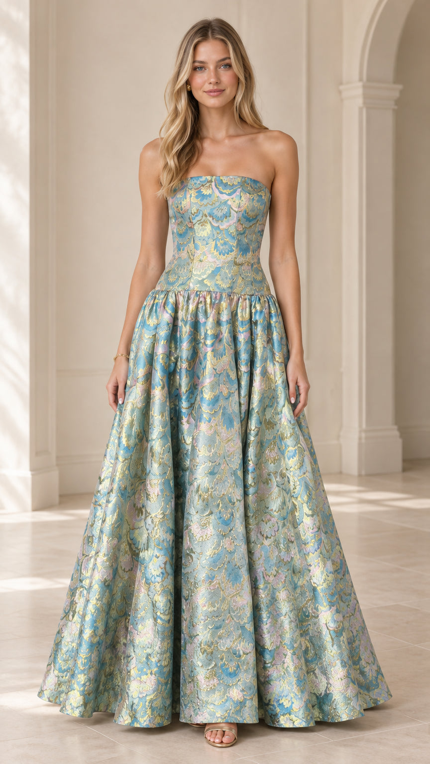 Front view of model wearing strapless floral jacquard maxi ball gown in aqua blue