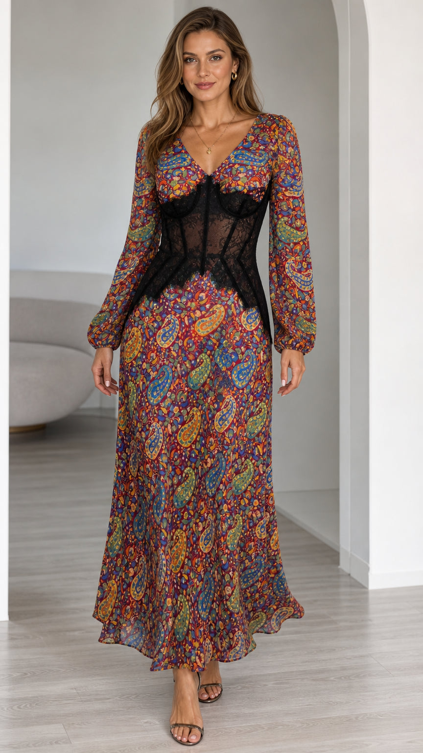 Front view of model wearing Burgundy Multi paisley print maxi dress with black lace corset waist