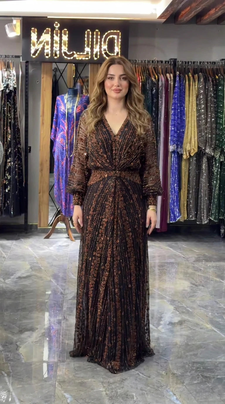 Front view of bronze black sequin embroidered V-neck lantern sleeve maxi evening gown