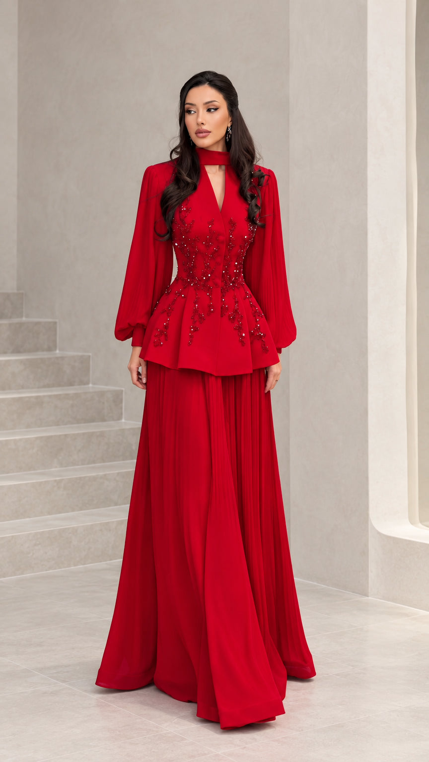 Front full view of woman wearing elegant red long-sleeve beaded peplum evening gown