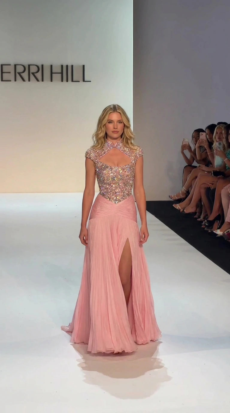 Front full-length view of model wearing Blush Pink beaded keyhole high-neck chiffon evening gown with slit