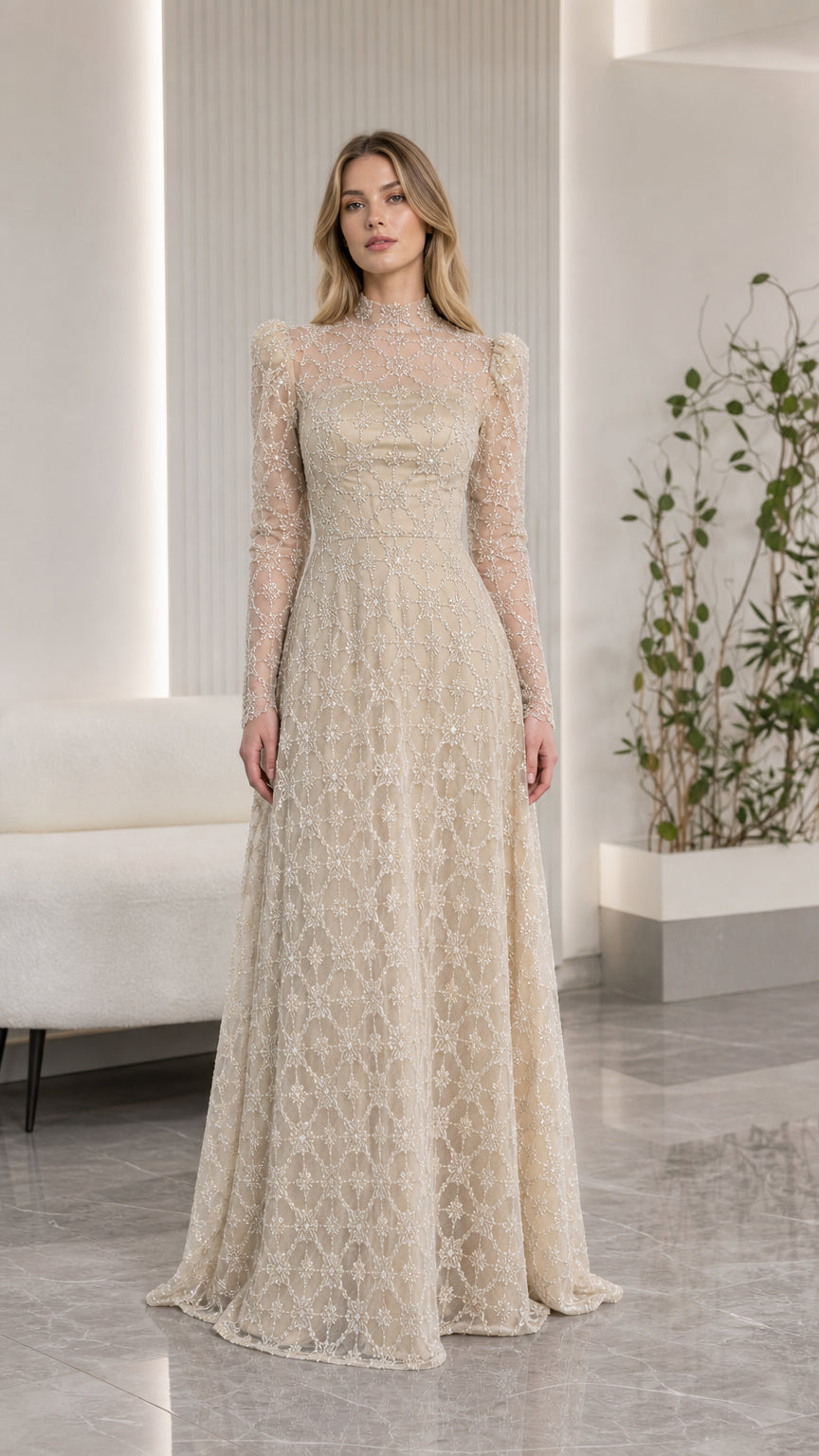 Front view of champagne high neck beaded long sleeve evening gown