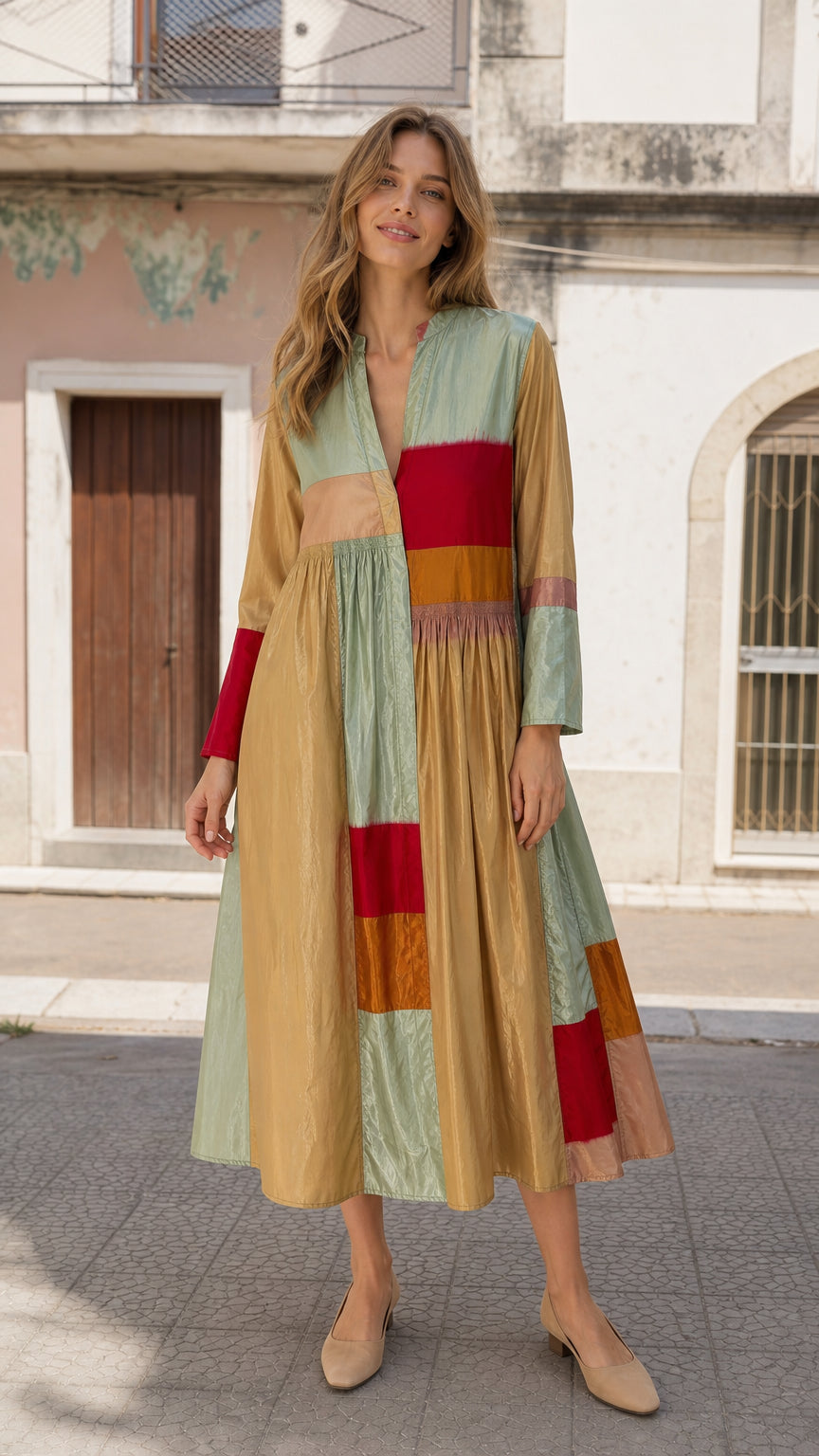 Front view of woman wearing olive boho colorblock midi dress