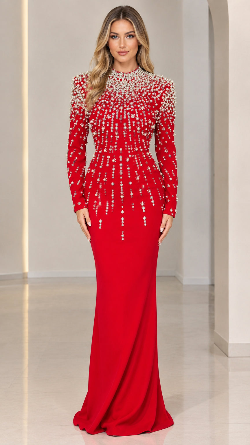 Front view of model wearing a vibrant red pearl-embellished long sleeve mermaid evening gown