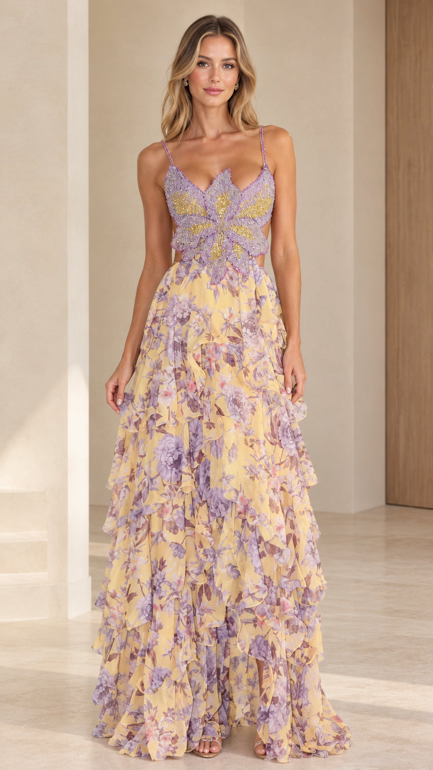 Front view of model wearing yellow floral butterfly beaded bodice tiered maxi dress