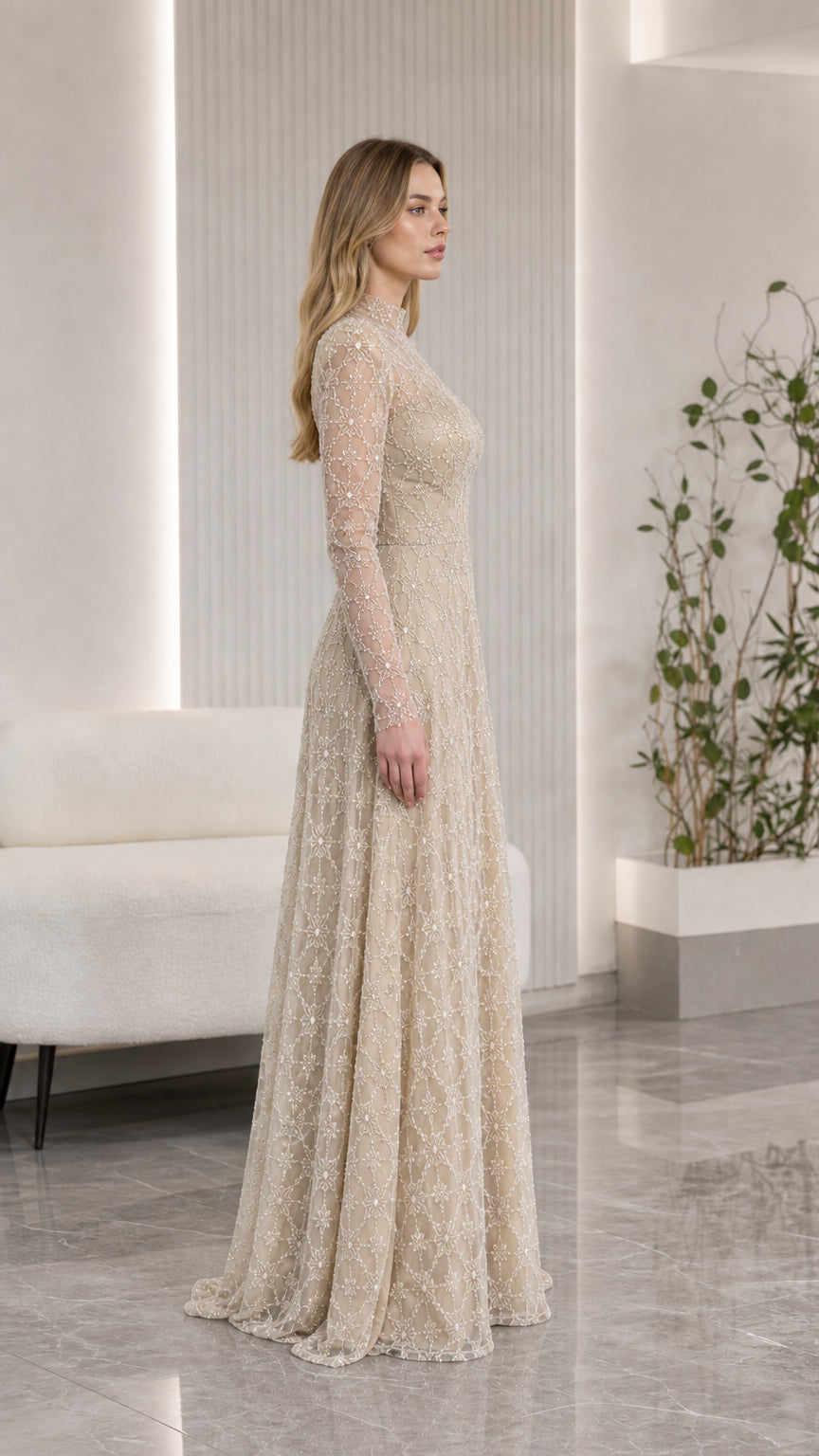 Side profile of elegant champagne beaded A-line formal maxi dress