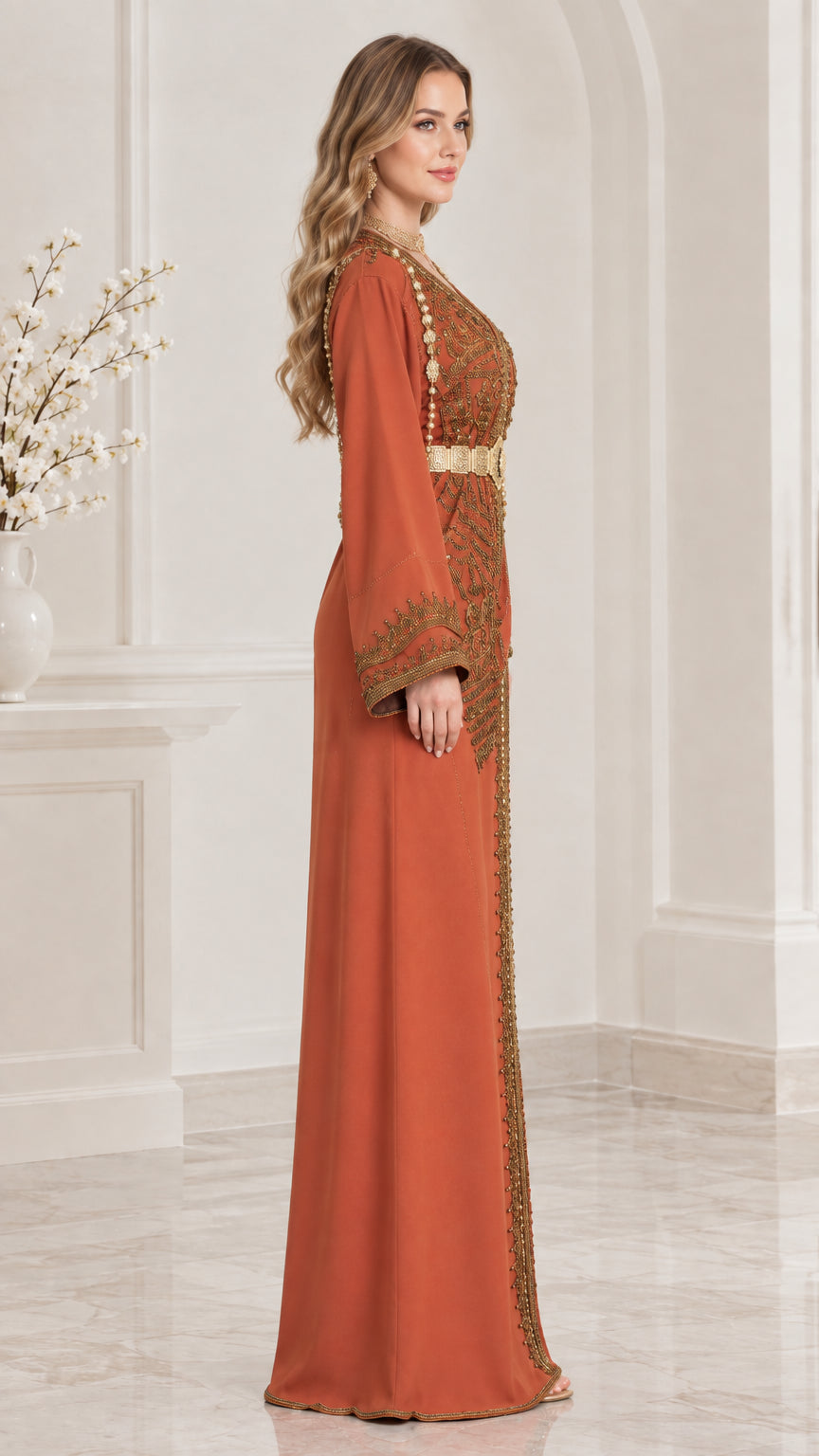 Side profile of woman in Rust embroidered long-sleeve kaftan dress