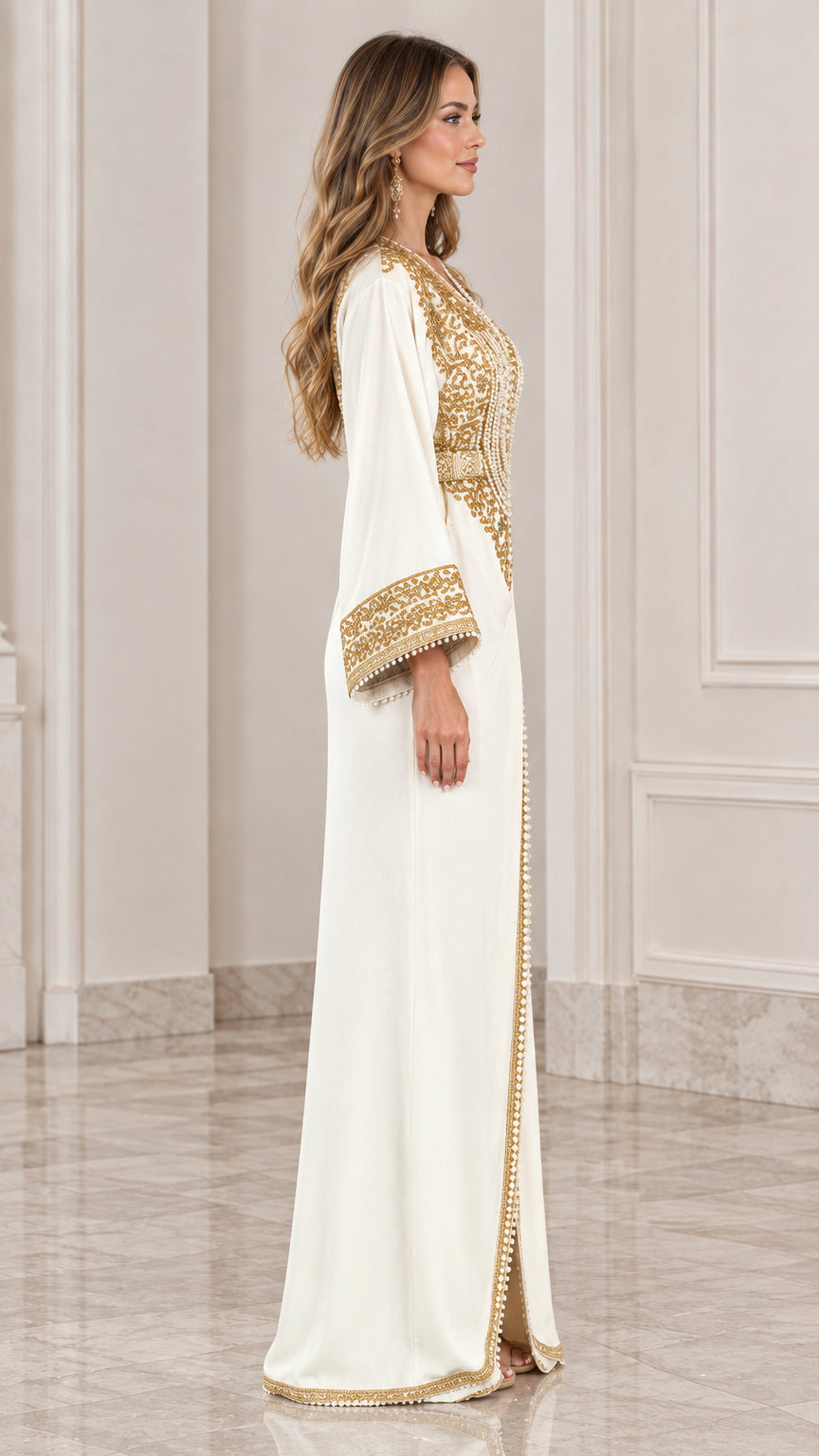 Side profile view of model in white gold-embroidered kaftan maxi dress