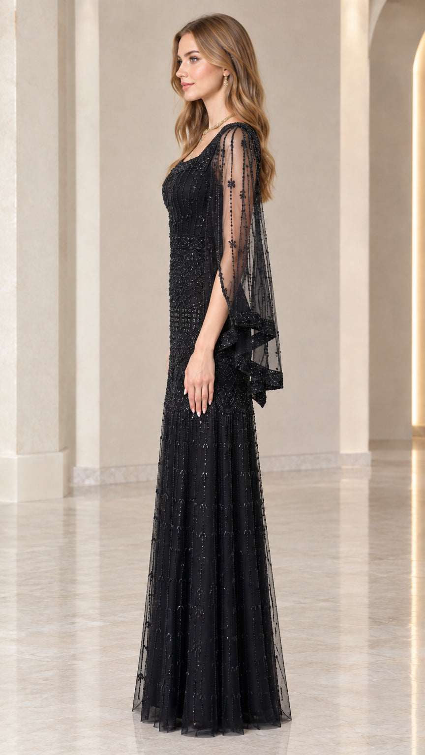 Side angle view of black sequin formal gown showing sleeve drape and column silhouette