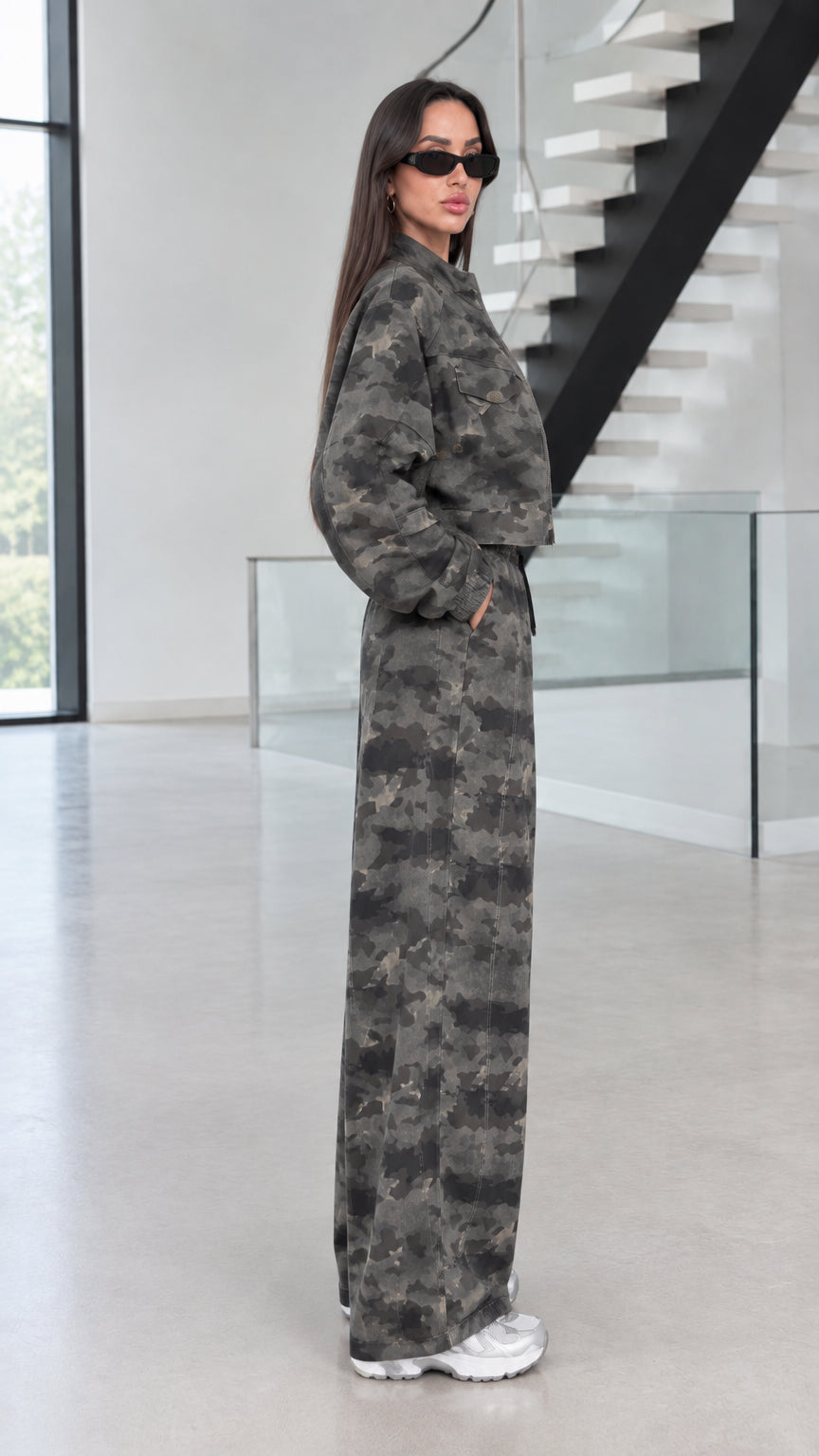 Side profile view of model wearing Green Camo two-piece set