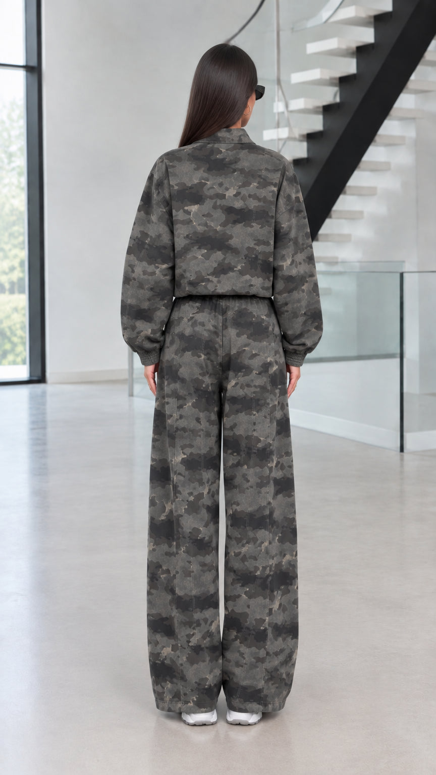 Back view of model wearing Green Camo cropped jacket and wide-leg trousers