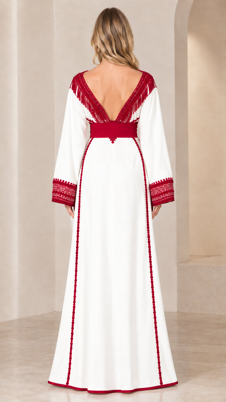 Back view of white caftan dress highlighting deep V-back with fringe and contrast trim