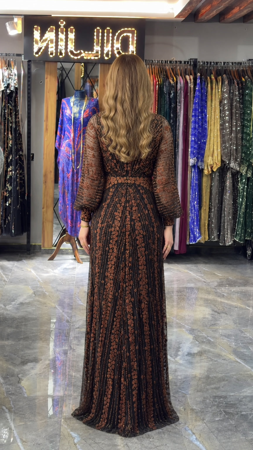 Back view of bronze black sequined maxi evening dress with fitted waistband