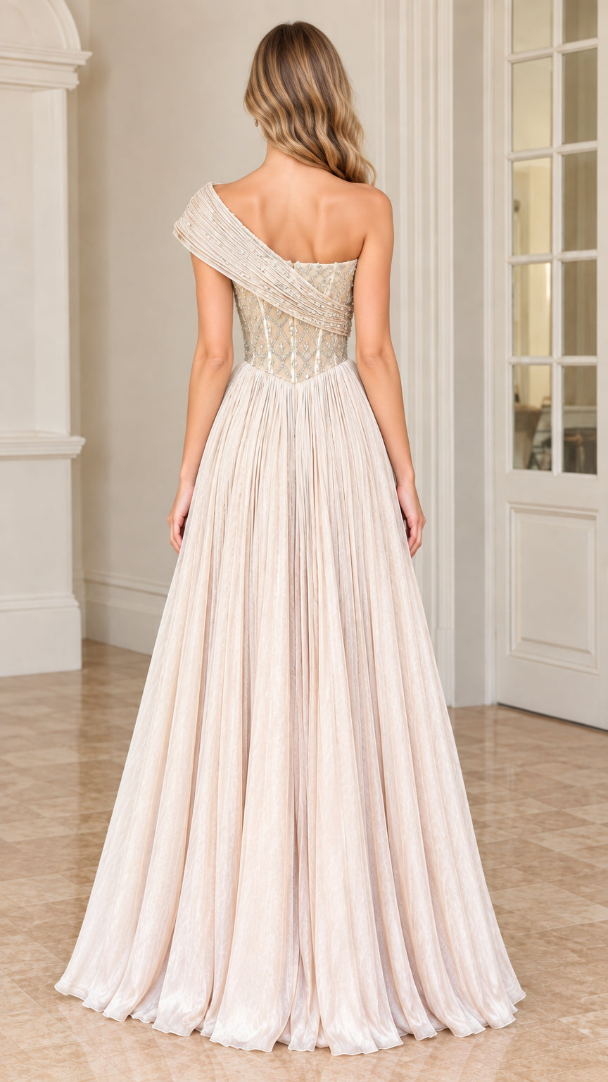 Back view of model showcasing Champagne one-shoulder pleated tulle gown