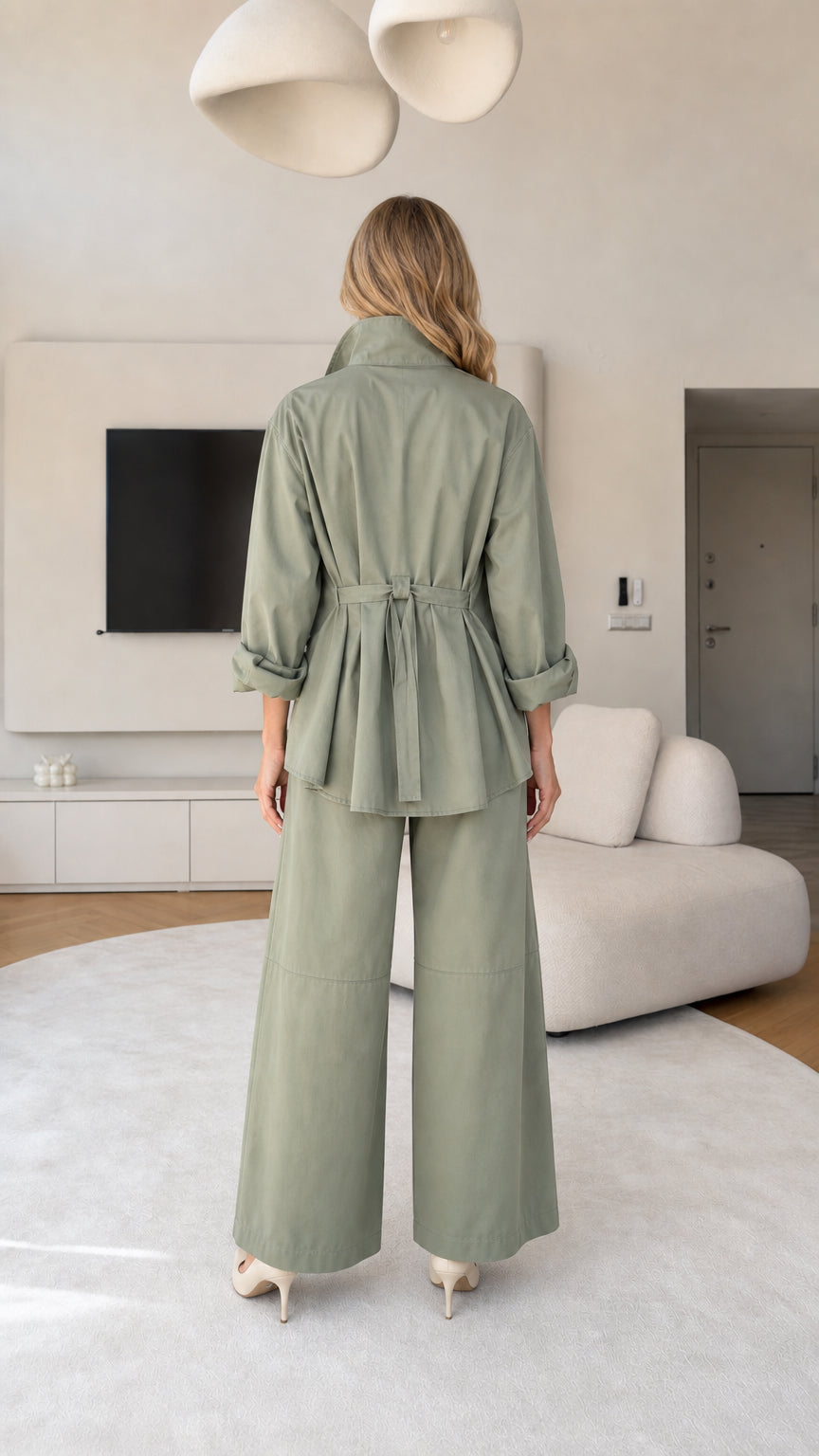 Back view of women's relaxed two-piece set in Sage Green showing back pleat and tab detail
