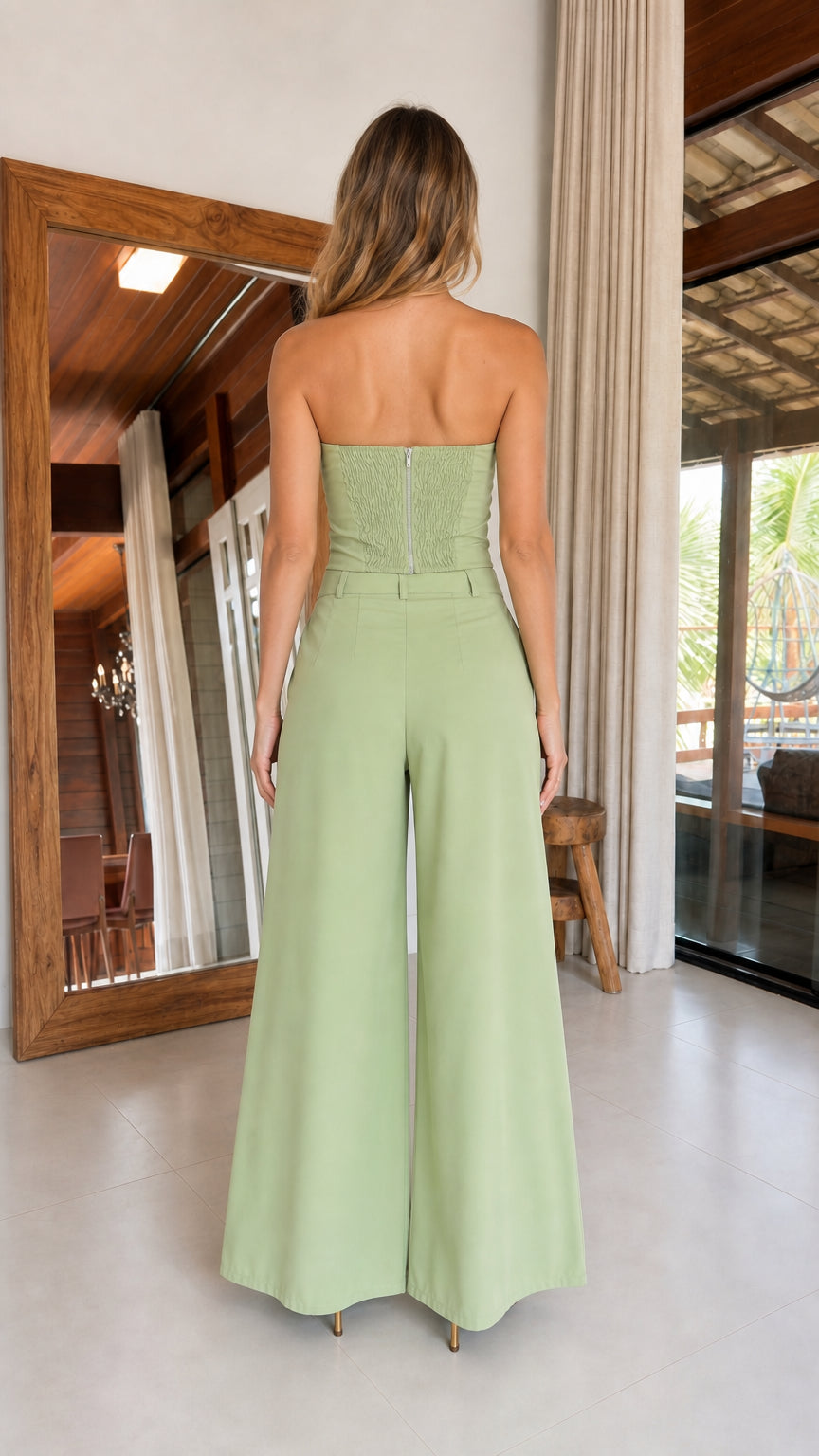 Back full view of model wearing Sage Green set showing smocked elastic back bodice and wide legs