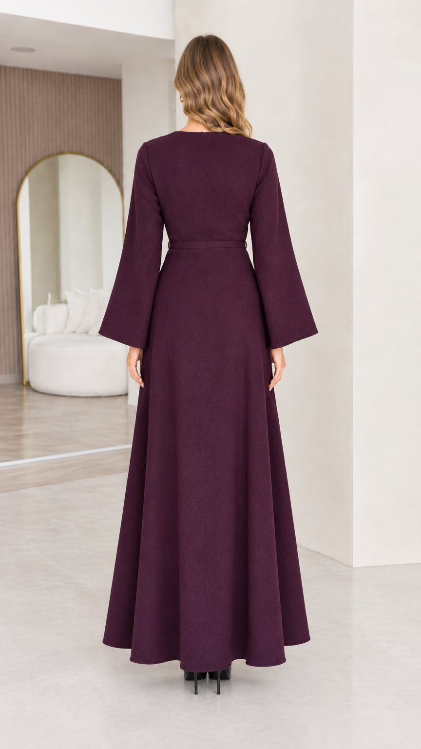 Back view of the burgundy maxi dress with flared sleeves and full-length skirt