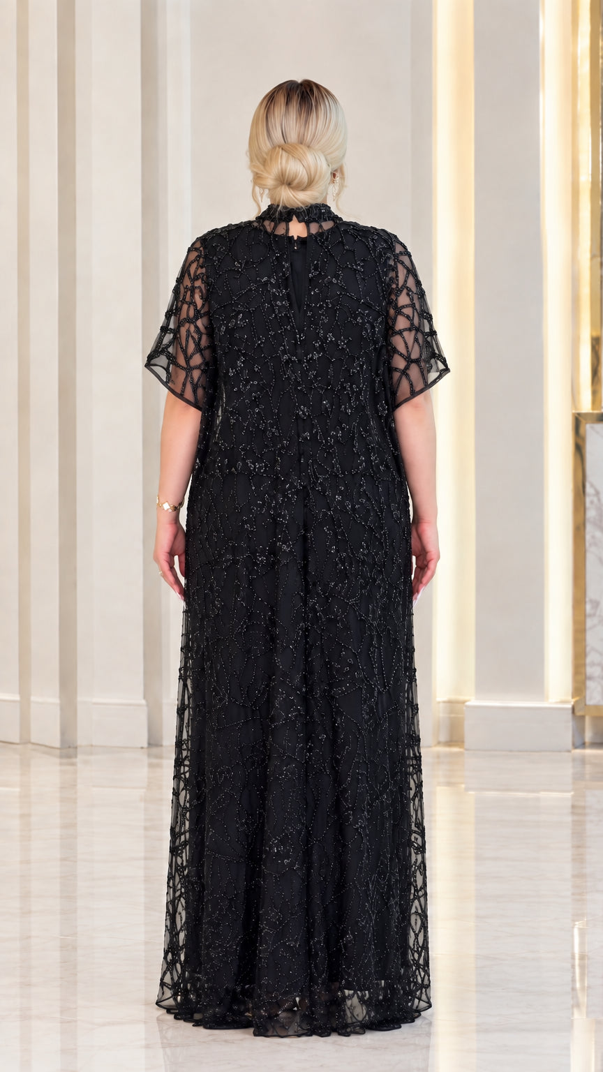 Back view of black high neck evening gown showing back closure
