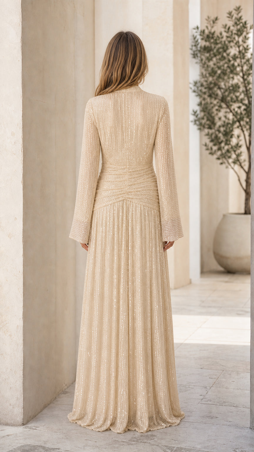 Back view of champagne shimmer pleated maxi dress