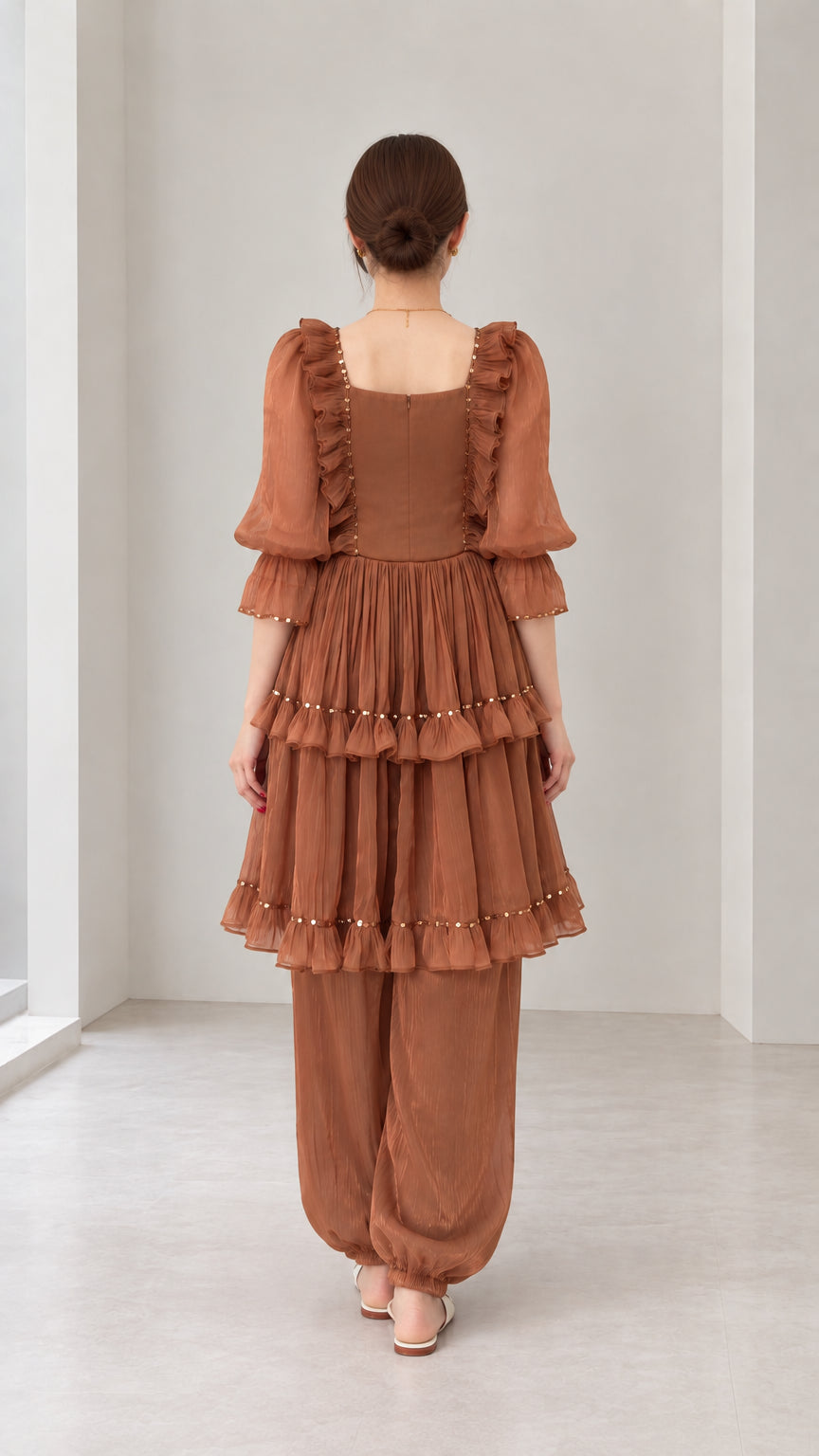 Back view of woman wearing Rust Brown square neck tiered ruffle matching outfit