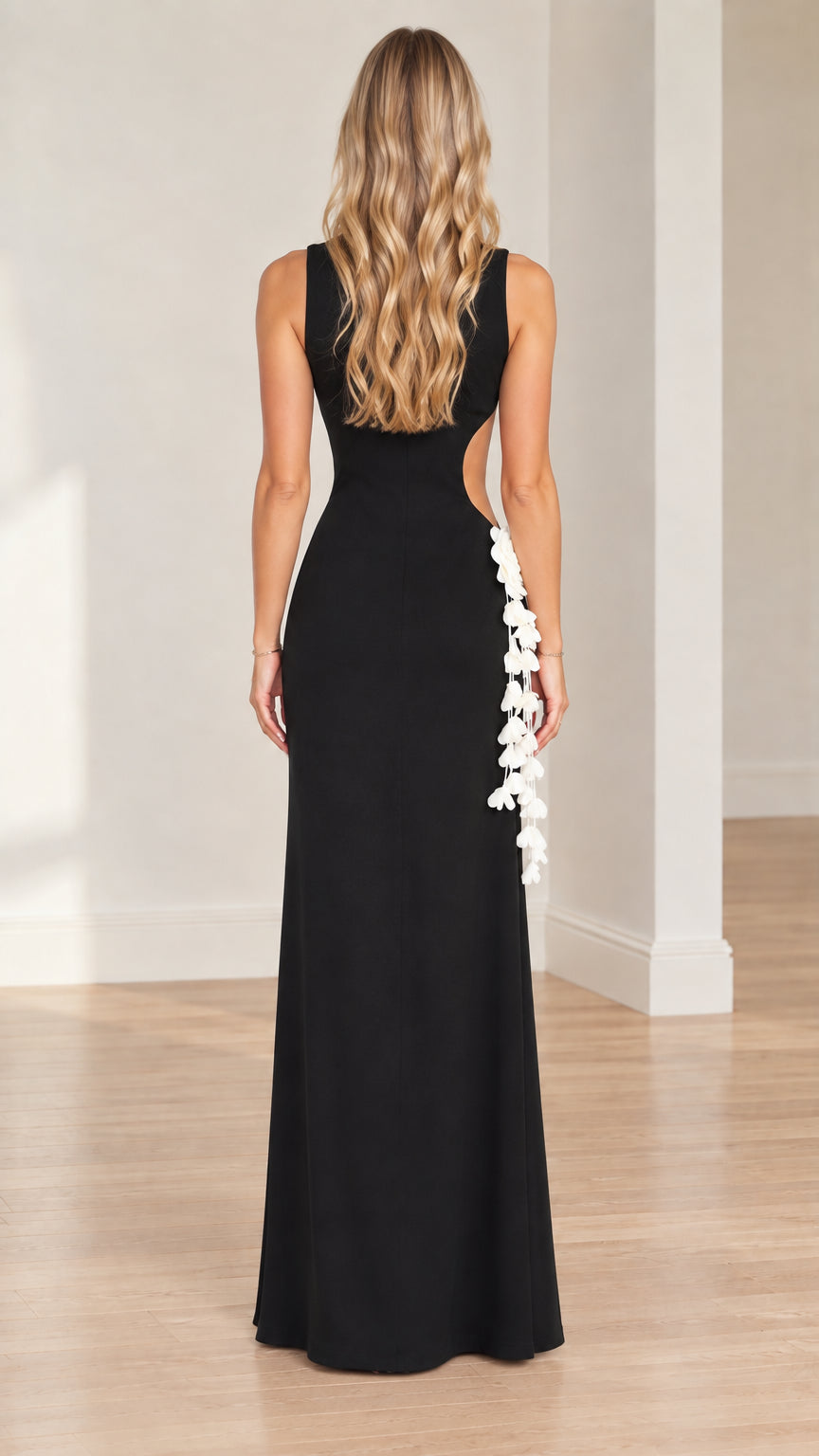 Back view of model in black column maxi dress