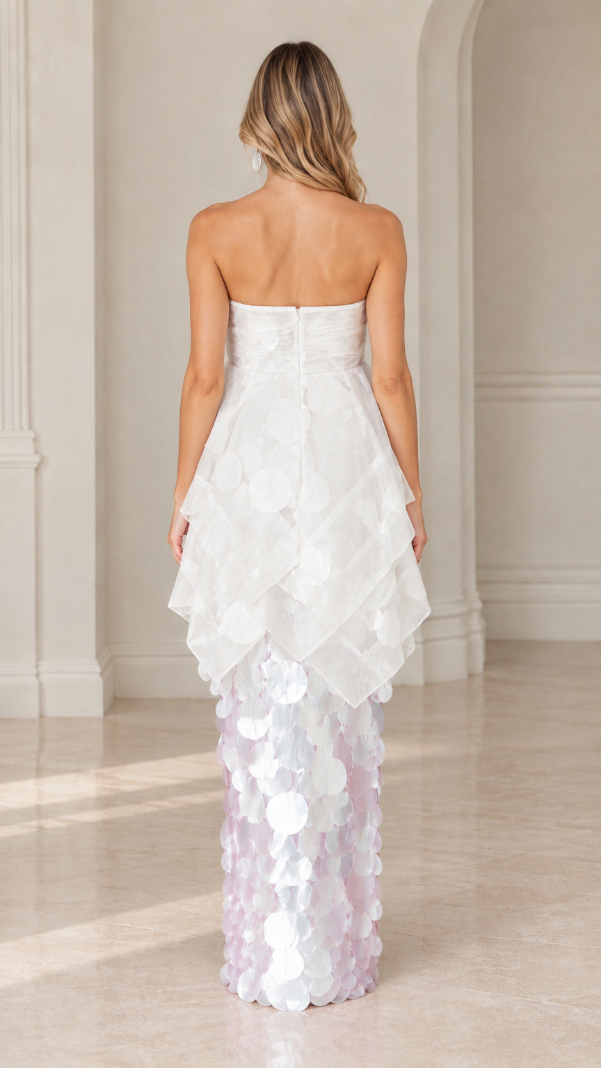Back view of model in white strapless organza paillette maxi gown