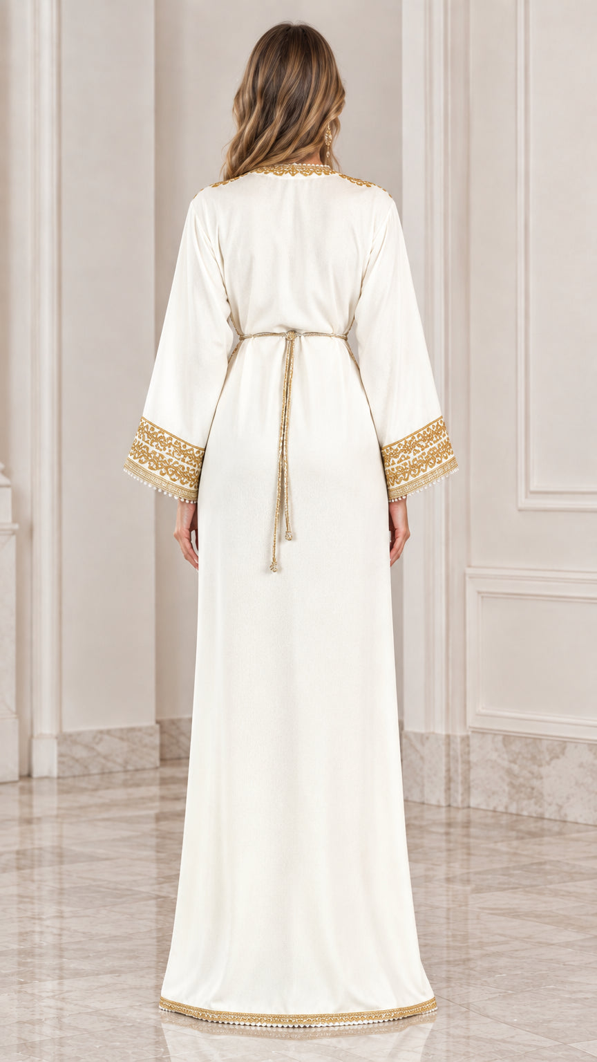 Back view of model wearing white kaftan maxi dress showing waist tie detail
