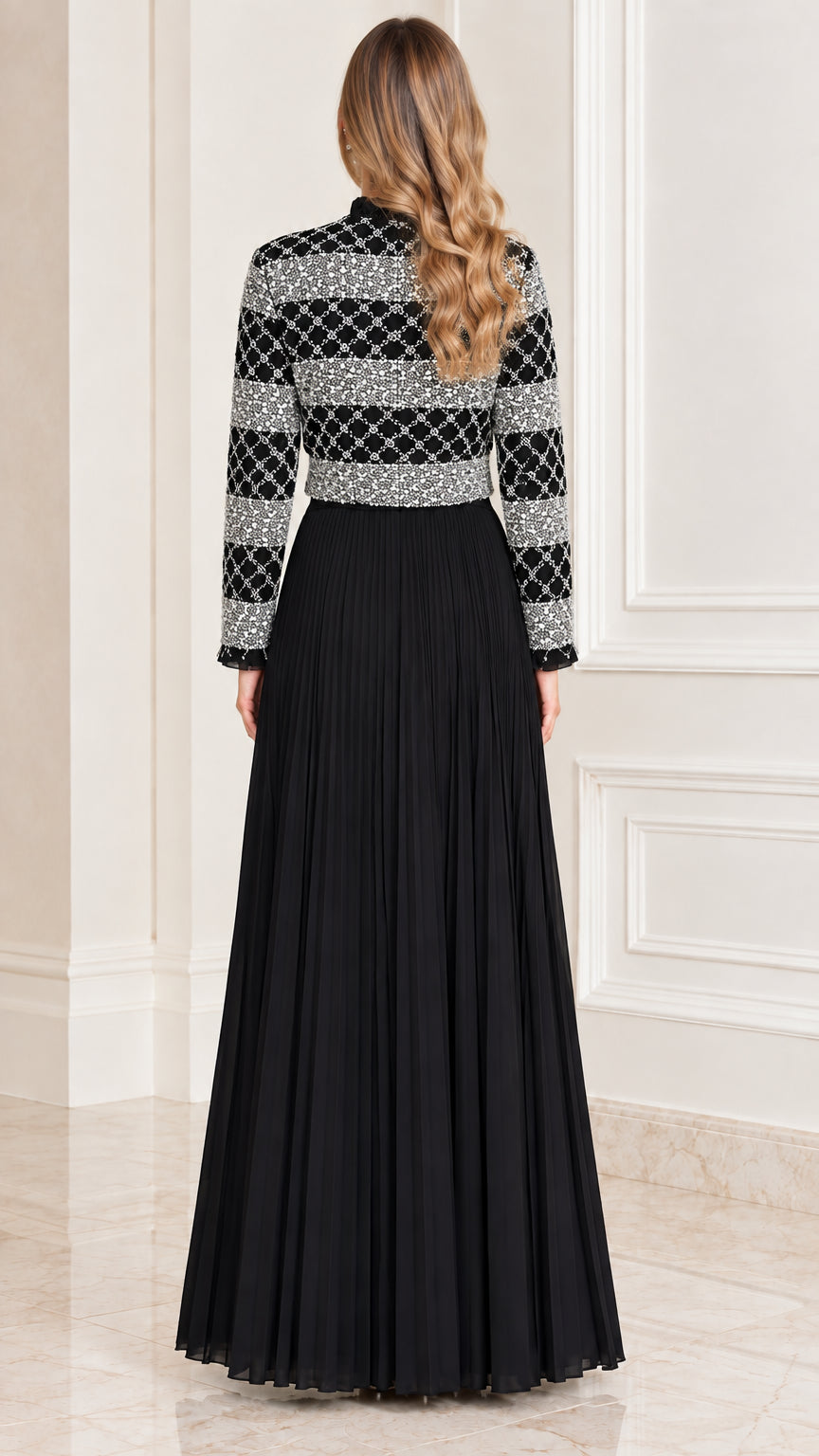 Back view of black sequined long sleeve pleated maxi dress