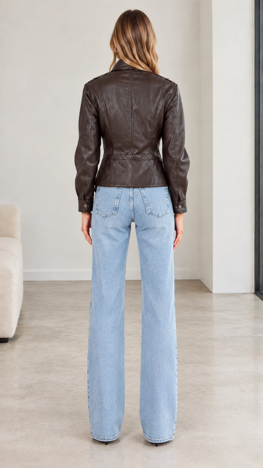 Back view of model wearing dark brown textured faux leather jacket