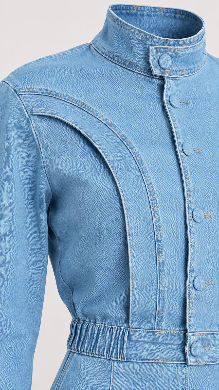 Close-up detail of high stand collar and curved chest piping on Light Blue denim dress