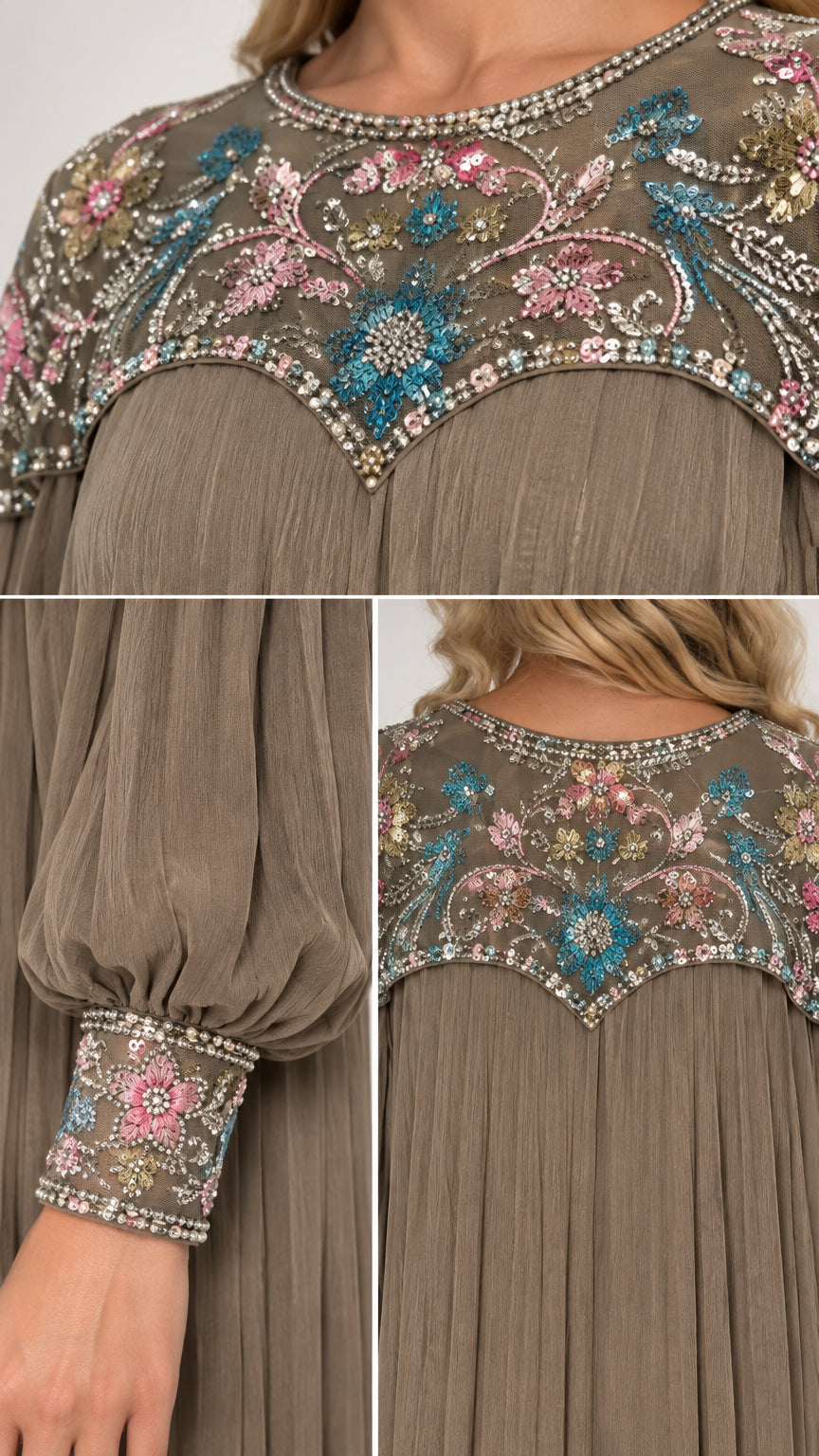 Close-up detail of colorful floral beading, sequins, and embroidered cuffs