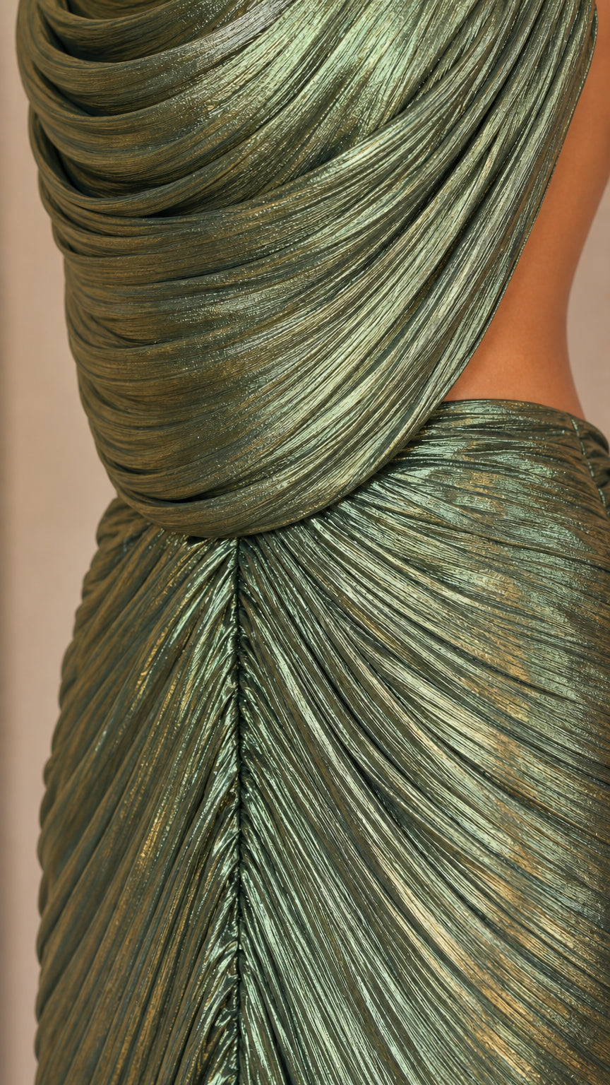 Close-up detail of metallic shimmer pleated draped fabric