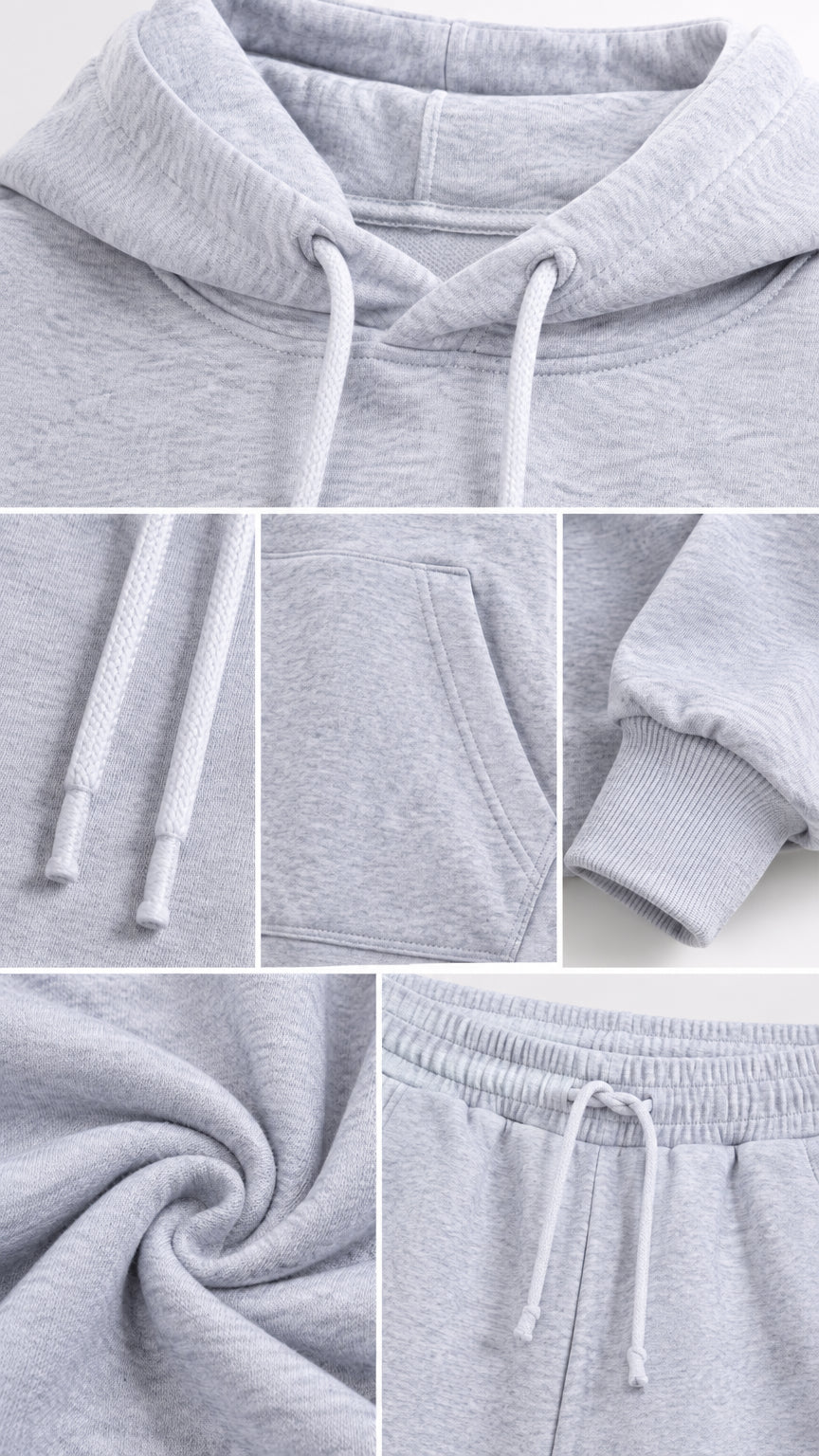 Detailed close-up of light grey hoodie neckline, drawstrings, kangaroo pocket, ribbed cuff, and elastic waistband