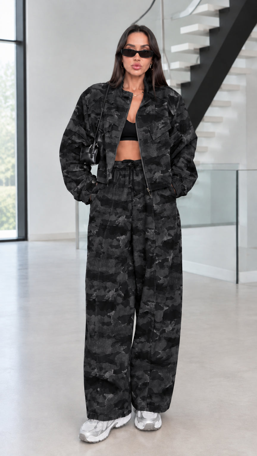 Model wearing Black Camo cropped jacket and wide-leg pants set