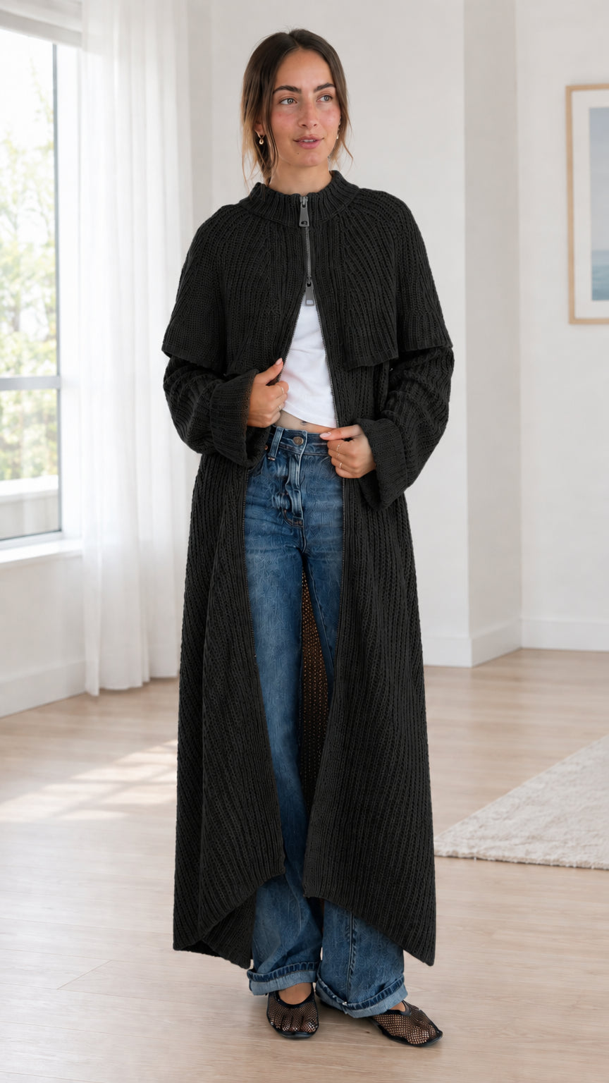 Front view of black ribbed knit longline capelet cardigan duster coat