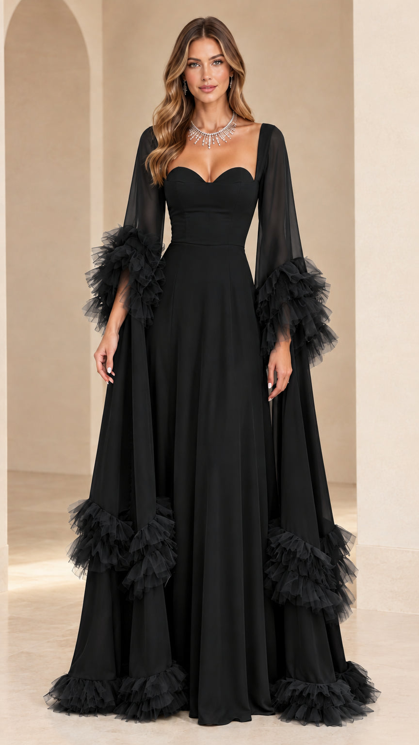 Black sweetheart neckline formal gown with tiered tulle ruffle cape sleeves