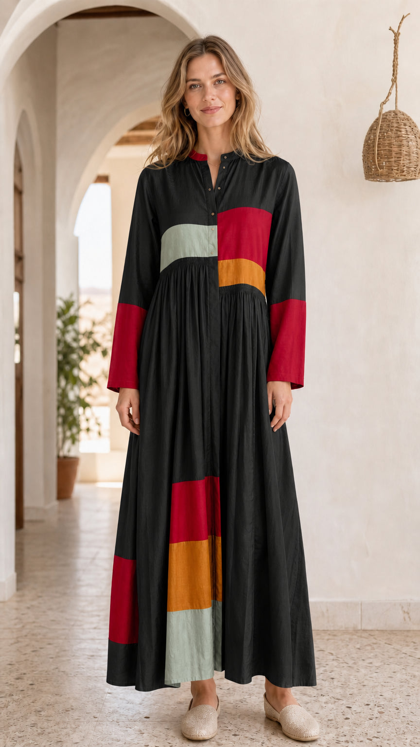 Front view of model wearing the black colorblock maxi dress variant
