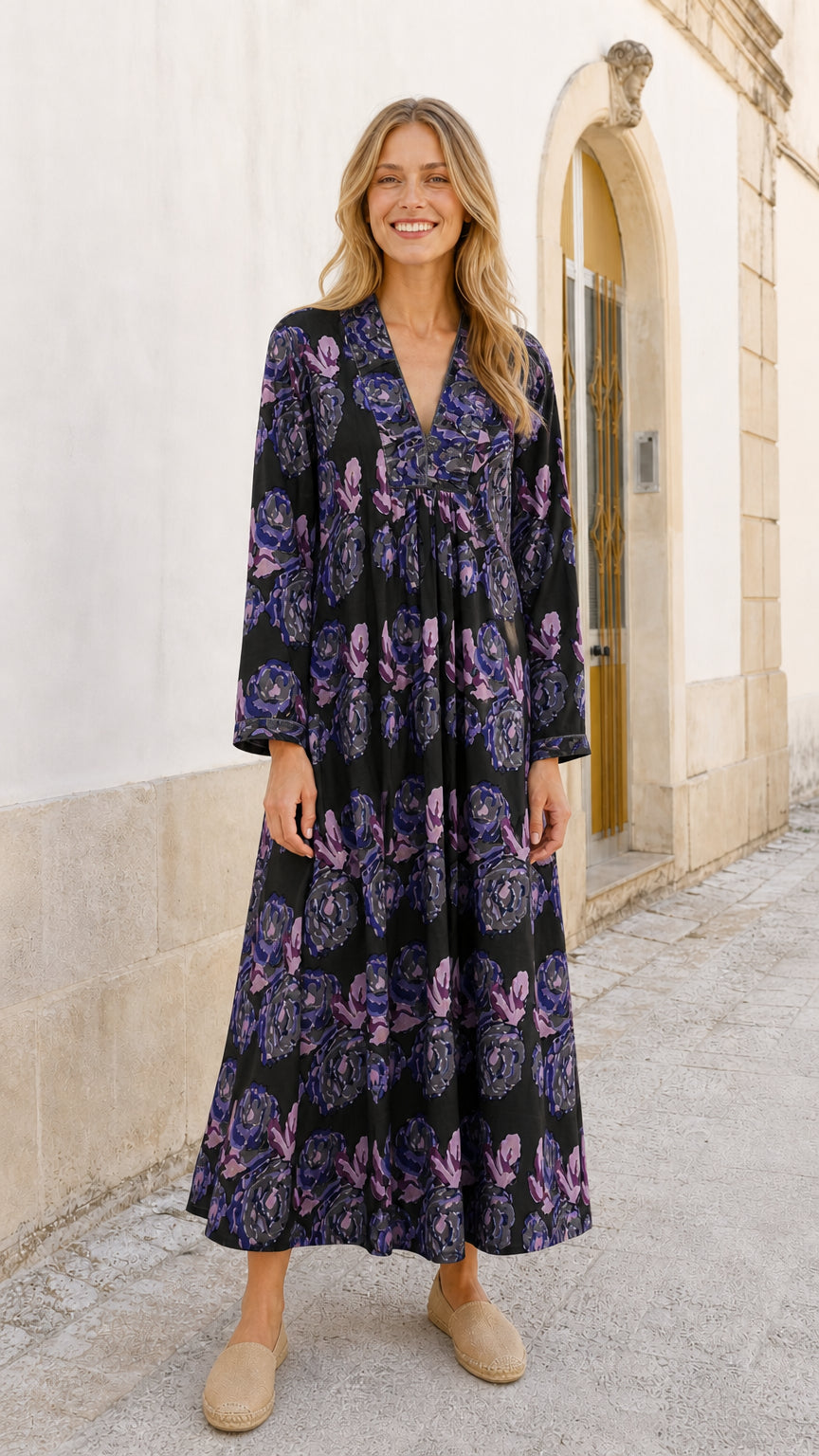 Model wearing black floral maxi dress