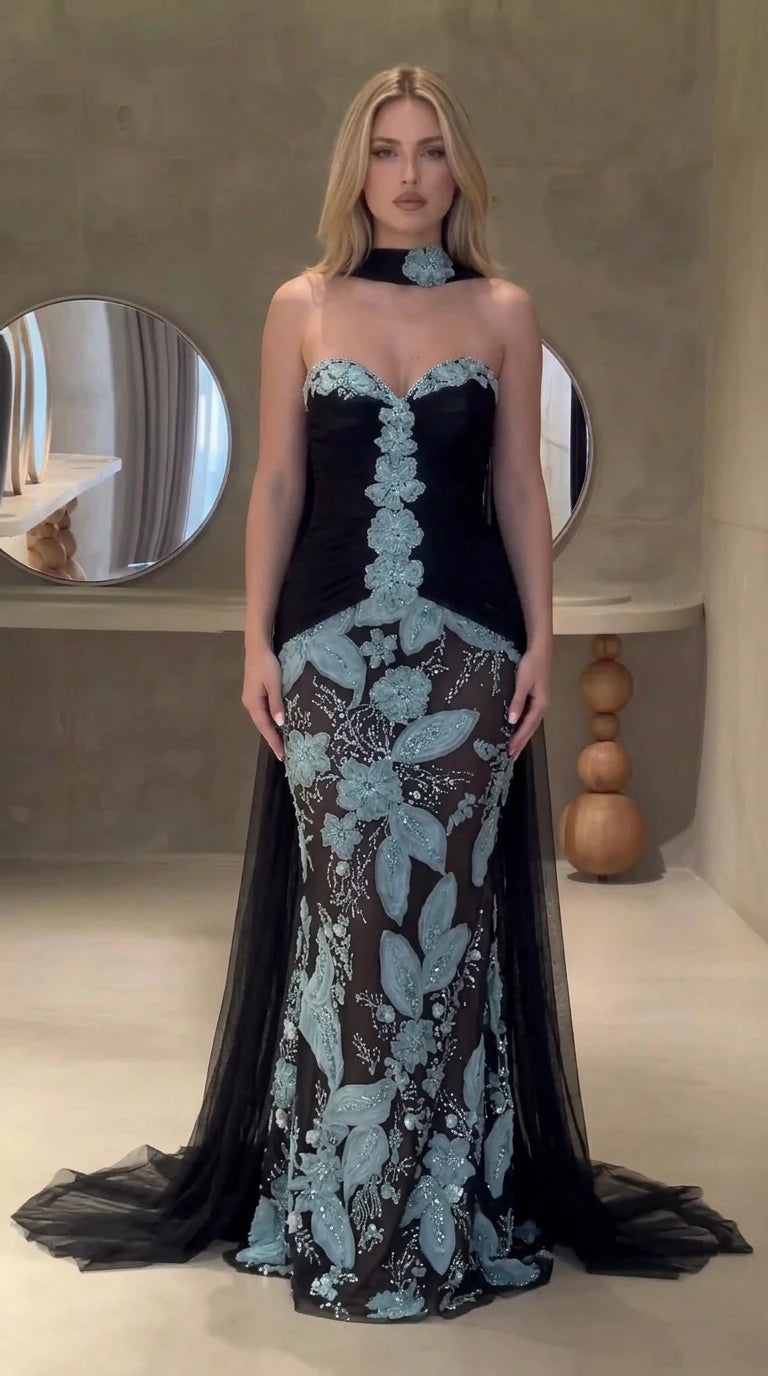 Black sweetheart mermaid evening gown with ice blue floral embroidery and cape