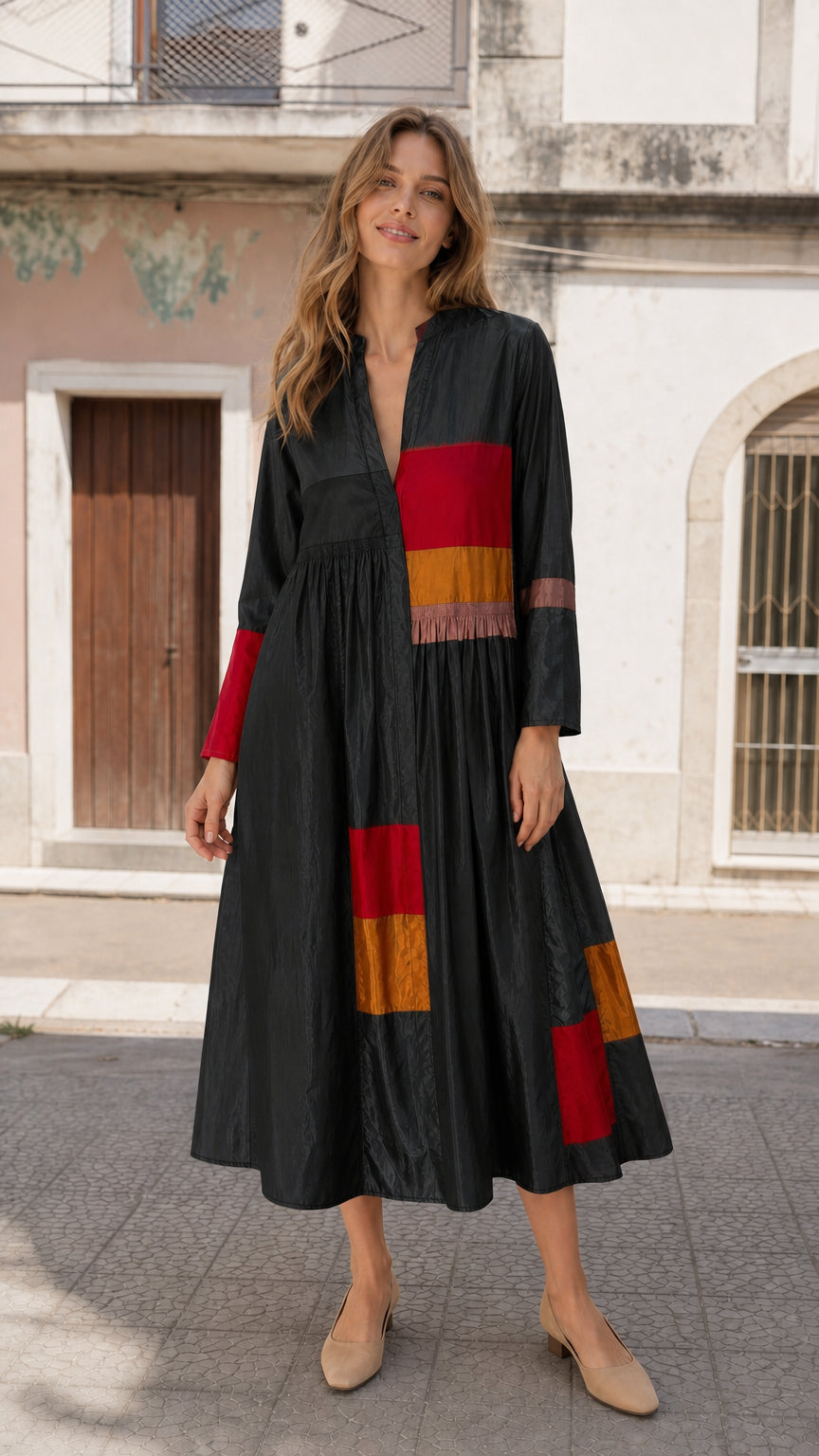 Woman wearing black boho colorblock midi dress