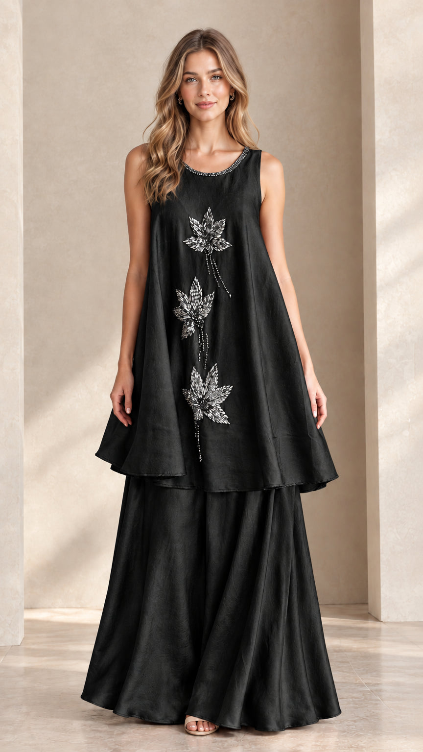 Front view of black sleeveless beaded tunic and palazzo pant set