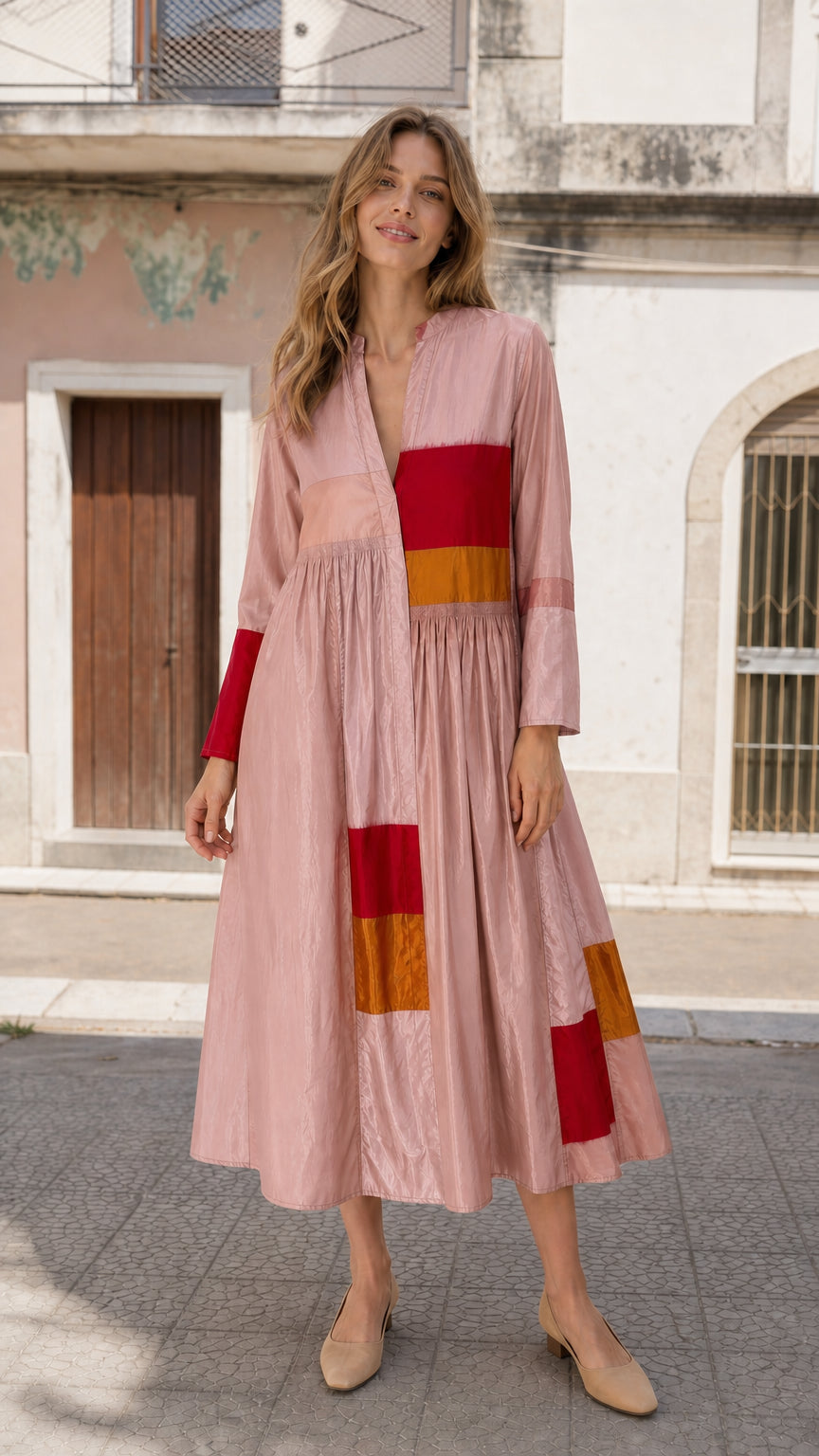 Woman wearing pink boho colorblock midi dress