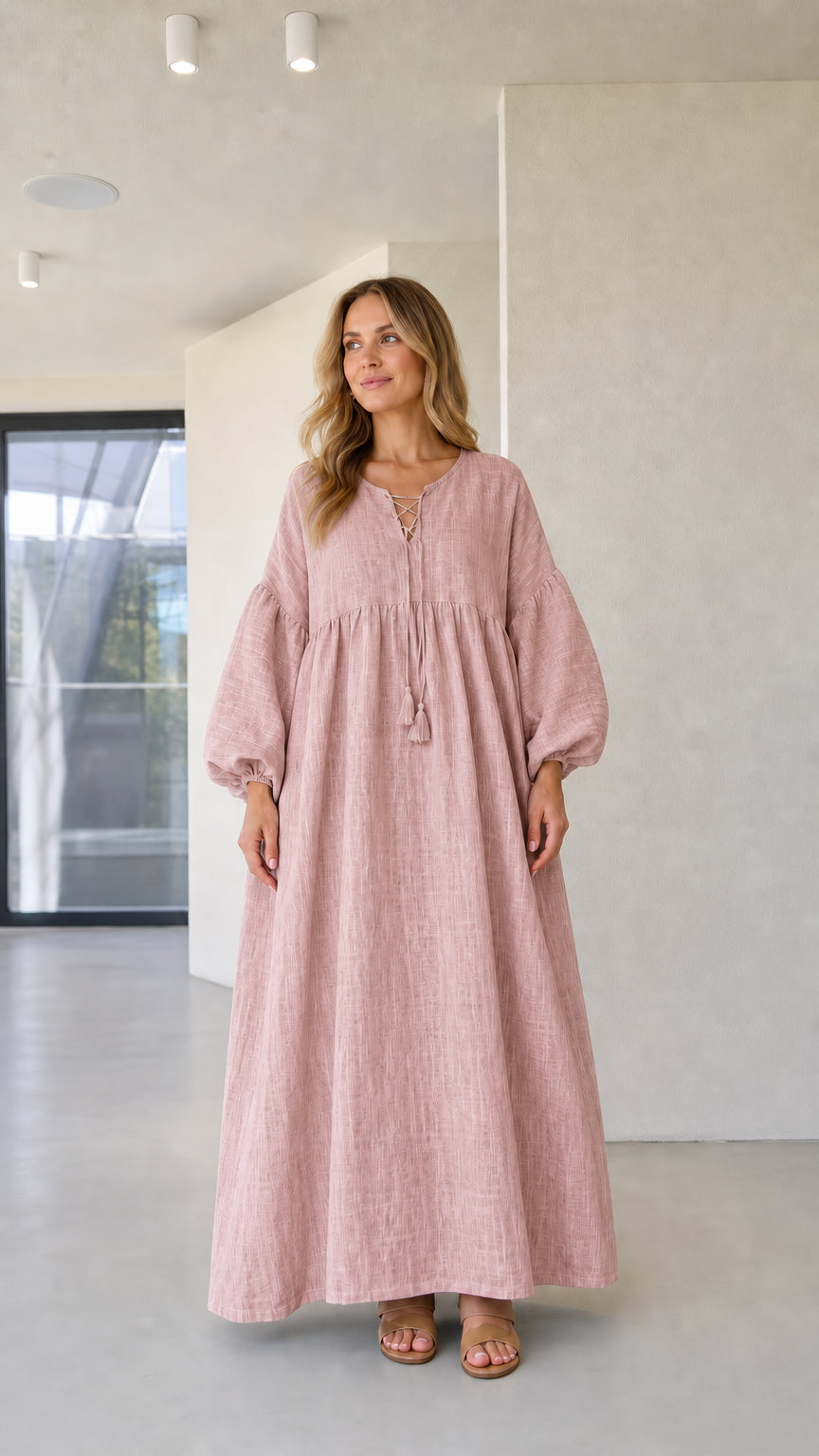 Model wearing blush pink boho textured gathered maxi dress