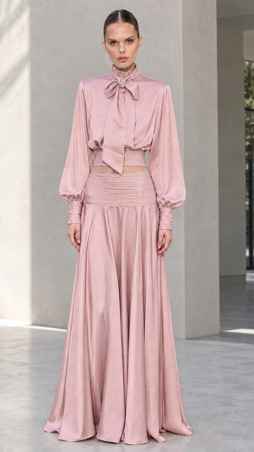 Full-length front view of blush pink satin bow tie blouse and maxi skirt set