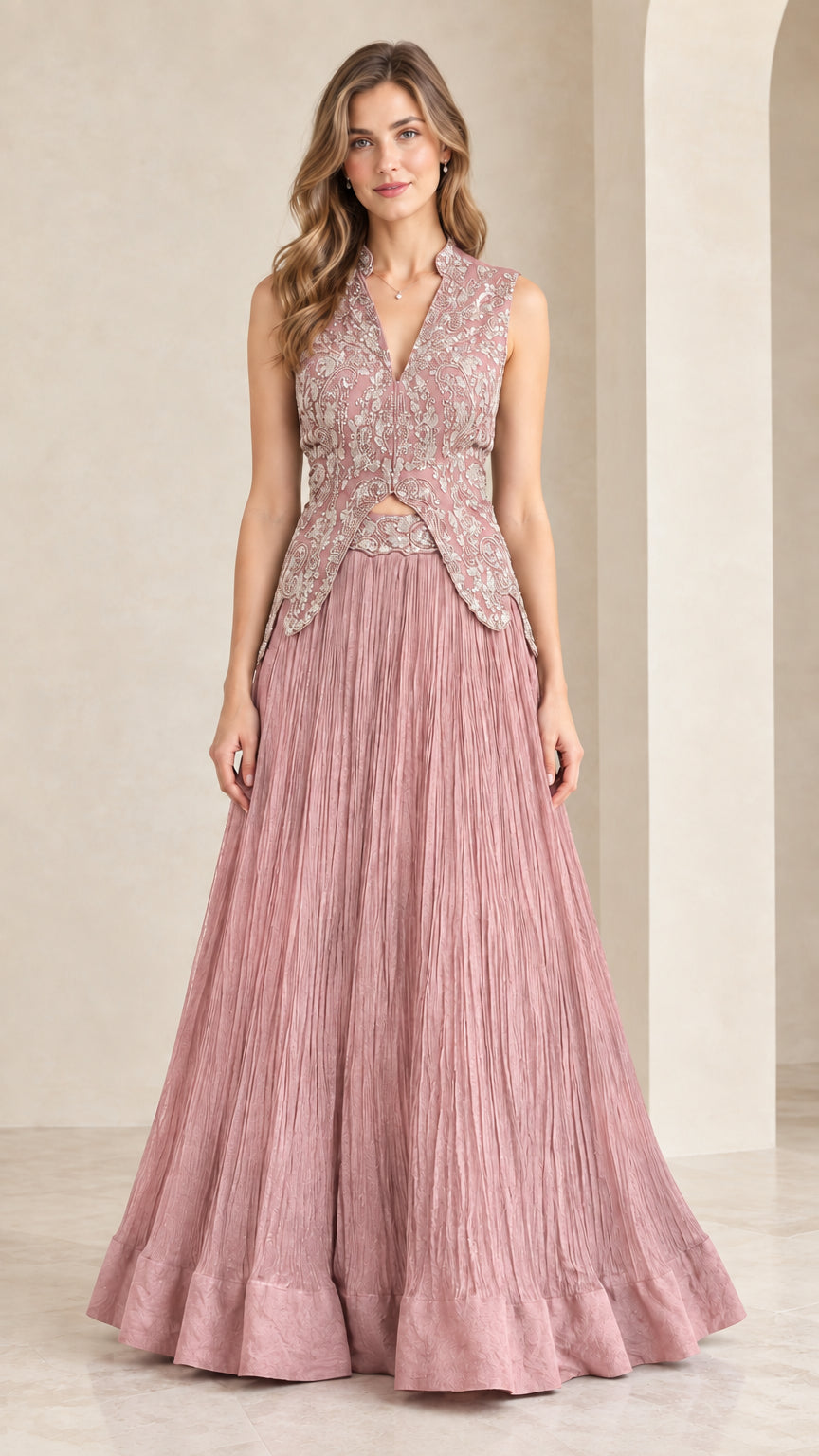 Front view of woman wearing dusty rose embroidered sleeveless maxi gown set