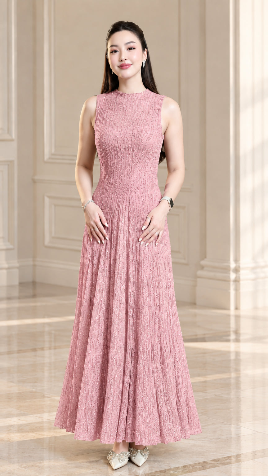 Front view of model wearing dusty pink sleeveless textured plissé maxi dress