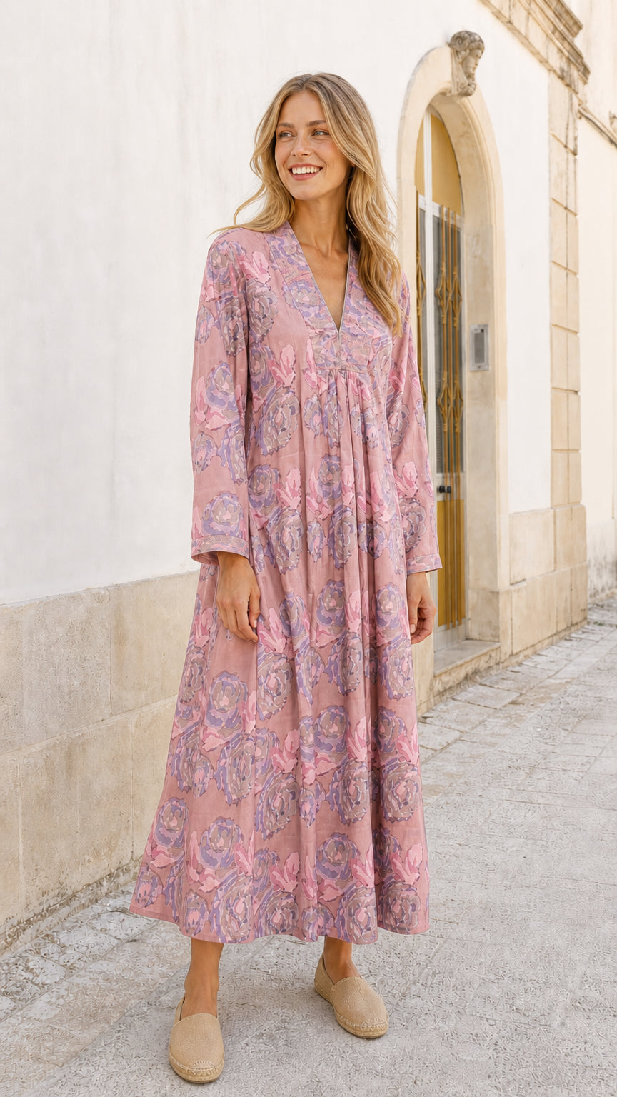 Model wearing pink floral maxi dress