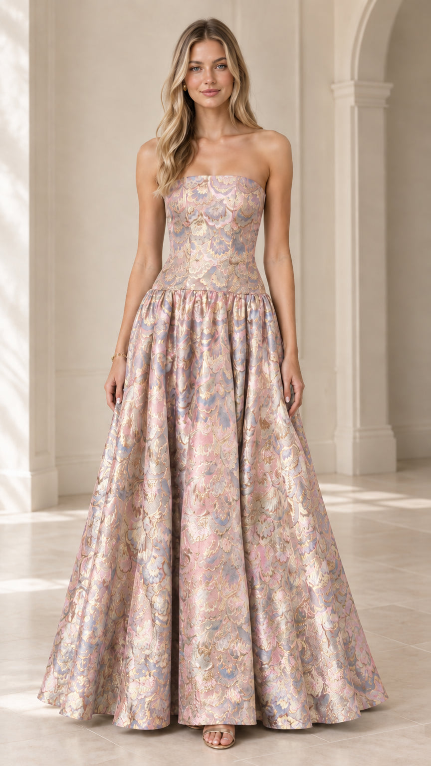 Model wearing strapless blush pink floral brocade formal maxi dress