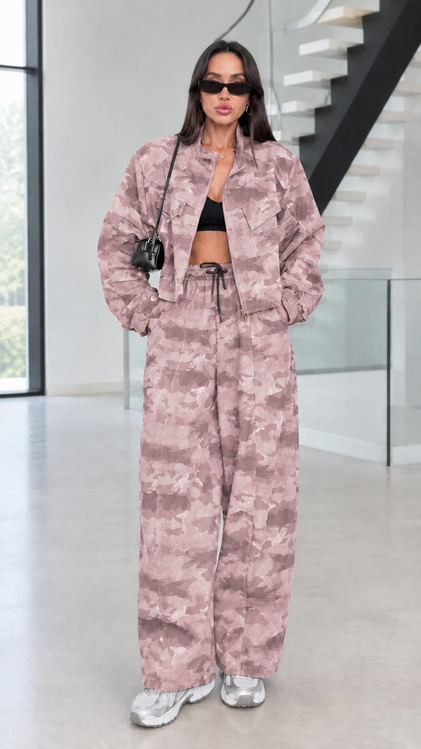 Model wearing Pink Camo cropped jacket and wide-leg pants set